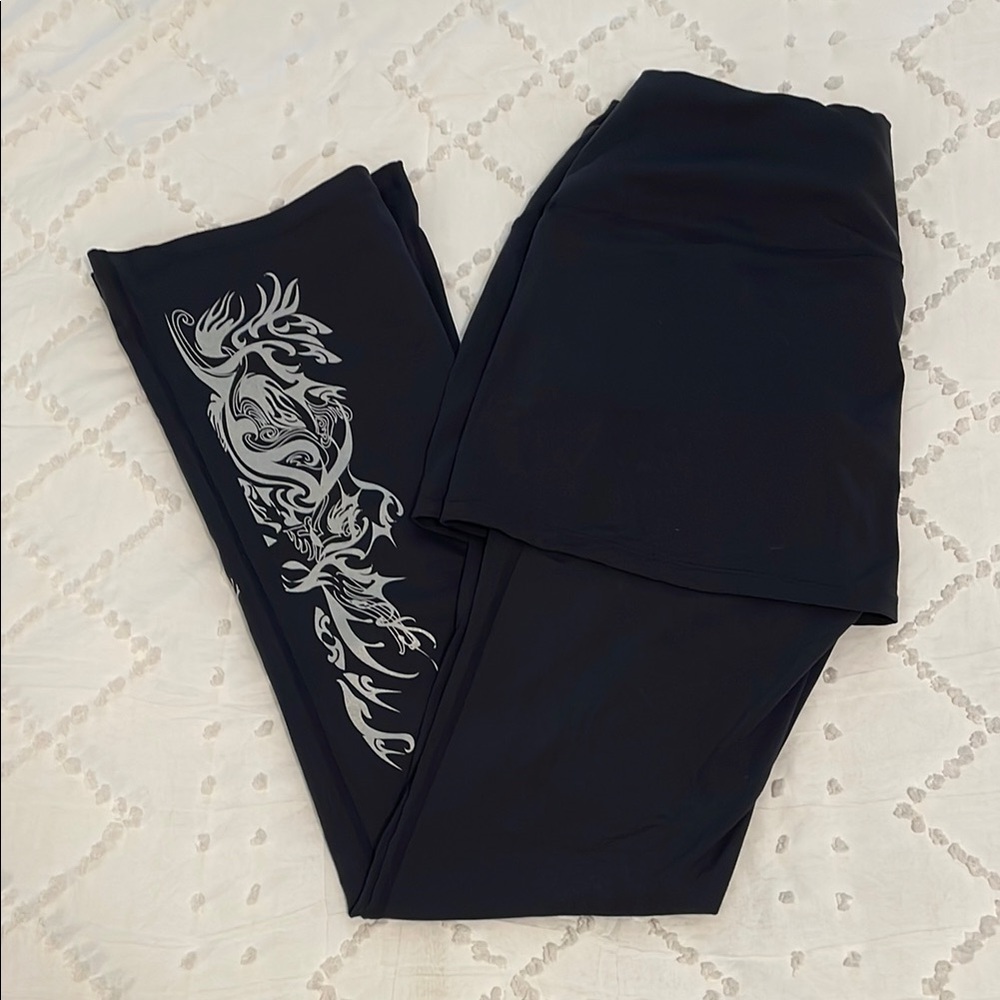 SkirtSports Black Skirted Leggings with Silver Graphic